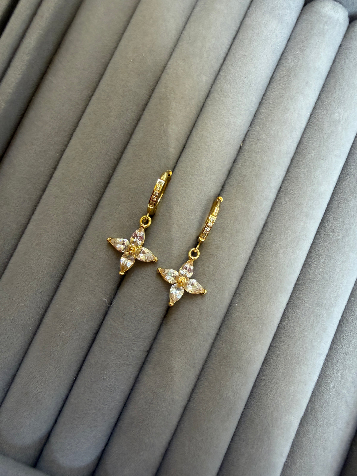 Star dangler earrings